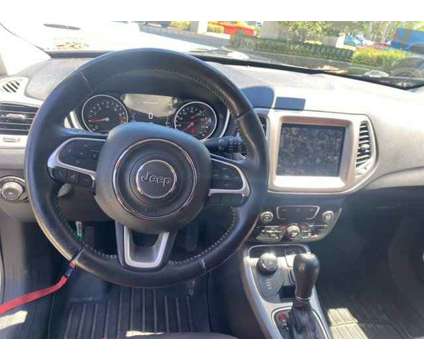 2017 Jeep New Compass Latitude is a White 2017 Jeep Compass Car for Sale in Orlando FL