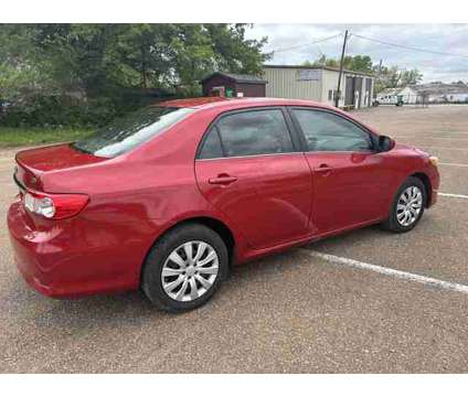 2013 Toyota Corolla for sale is a Red 2013 Toyota Corolla Car for Sale in Olive Branch MS