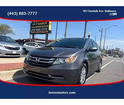 2014 Honda Odyssey for sale is a Grey 2014 Honda Odyssey Car for Sale in Baltimore MD