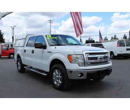 2014 Ford F150 SuperCrew Cab for sale is a White 2014 Ford F-150 SuperCrew Car for Sale in Spanaway WA
