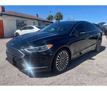 2018 Ford Fusion for sale is a Black 2018 Ford Fusion Car for Sale in Orlando FL