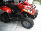 (2)2007 Artic Cat four wheelers and trailer