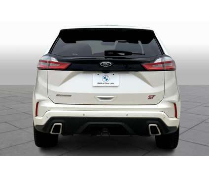 2019UsedFordUsedEdgeUsed4dr AWD is a Silver, White 2019 Ford Edge Car for Sale in League City TX