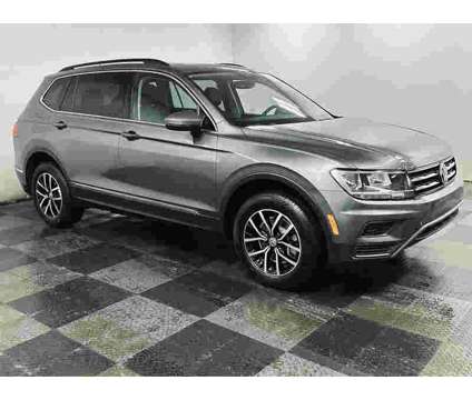2021UsedVolkswagenUsedTiguanUsed2.0T 4MOTION is a Grey, Silver 2021 Volkswagen Tiguan Car for Sale in Brunswick OH