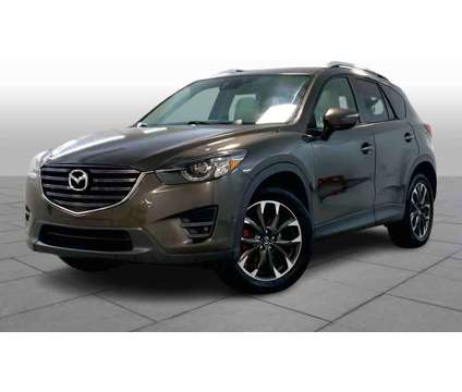 2016UsedMazdaUsedCX-5Used2016.5 FWD 4dr Auto is a Silver 2016 Mazda CX-5 Car for Sale in Merriam KS