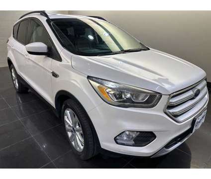 2019 Ford Escape SEL is a Silver, White 2019 Ford Escape SEL Car for Sale in Madison WI