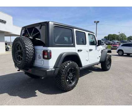 2024 Jeep Wrangler Willys is a White 2024 Jeep Wrangler Car for Sale in Covington TN