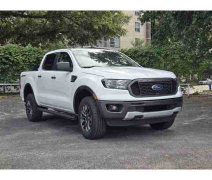 2020 Ford Ranger Xlt is a White 2020 Ford Ranger XLT Car for Sale in Houston TX