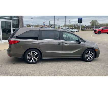 2022 Honda Odyssey Touring is a Tan 2022 Honda Odyssey Touring Car for Sale in Appleton WI