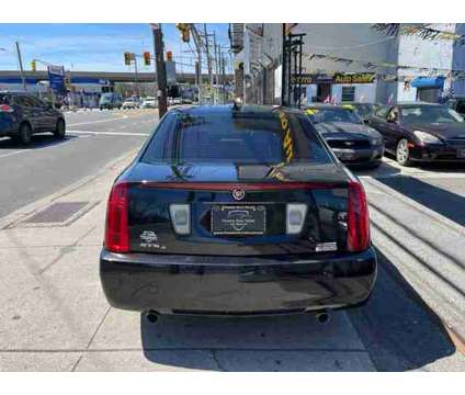 2010 Cadillac STS for sale is a Black 2010 Cadillac STS Car for Sale in Jersey City NJ
