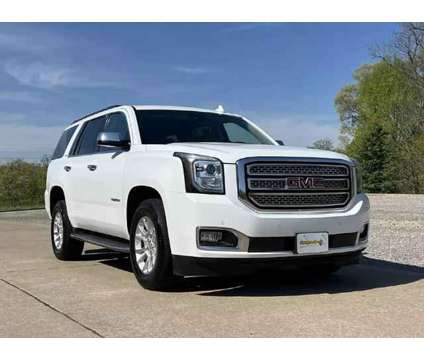 2016 GMC Yukon for sale is a White 2016 GMC Yukon 1500 4dr Car for Sale in Jackson MO