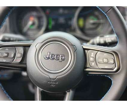 2024 Jeep Wrangler 4xe Rubicon 4x4 is a Black 2024 Jeep Wrangler SUV in Freehold NJ