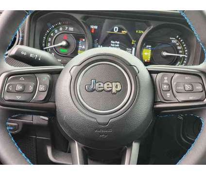 2024 Jeep Wrangler 4xe Rubicon 4x4 is a Green 2024 Jeep Wrangler SUV in Freehold NJ