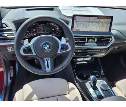 2024 BMW X3 M40i is a Red 2024 BMW X3 M40i SUV in Loveland CO