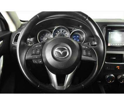 2016 Mazda CX-5 Touring is a Silver 2016 Mazda CX-5 Touring SUV in Orlando FL