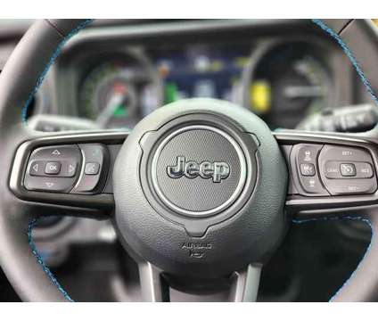 2024 Jeep Wrangler 4xe Rubicon 4x4 is a White 2024 Jeep Wrangler SUV in Freehold NJ