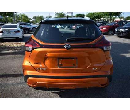 2024 Nissan Kicks SV Xtronic CVT is a Black, Orange 2024 Nissan Kicks SV Station Wagon in Orlando FL
