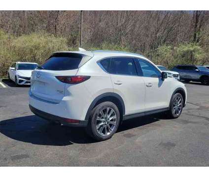 2021 Mazda CX-5 Signature is a White 2021 Mazda CX-5 SUV in Plainfield CT