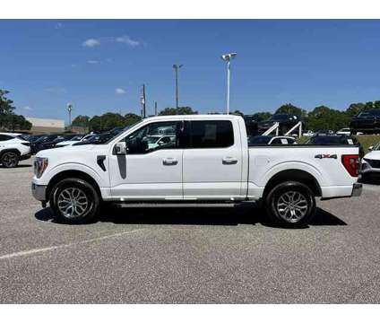2022 Ford F-150 LARIAT is a Brown 2022 Ford F-150 Lariat Truck in Mobile AL