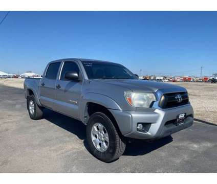 2014 Toyota Tacoma SR5 V6 is a Silver 2014 Toyota Tacoma SR5 Truck in Council Bluffs IA