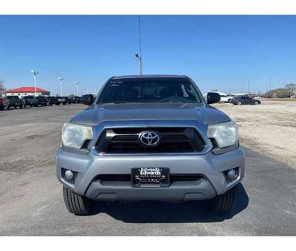 2014 Toyota Tacoma SR5 V6 is a Silver 2014 Toyota Tacoma SR5 Truck in Council Bluffs IA