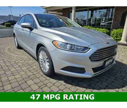 2014 Ford Fusion Hybrid S is a Silver 2014 Ford Fusion Hybrid S Hybrid in Bowling Green OH