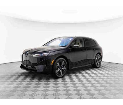 2024 BMW iX xDrive50 is a Black 2024 BMW 325 Model iX SUV in Barrington IL