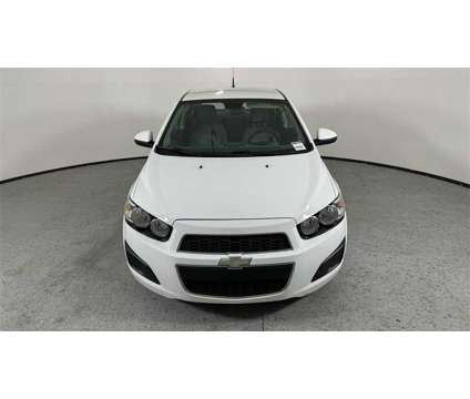 2012 Chevrolet Sonic 1LT is a White 2012 Chevrolet Sonic 1LT Sedan in Las Vegas NV