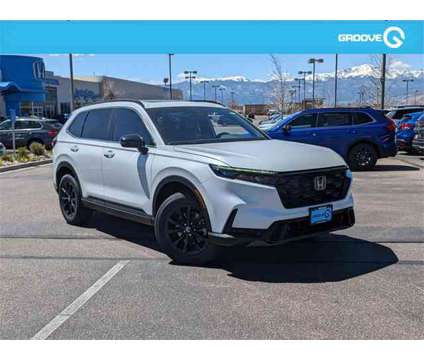 2024 Honda CR-V Hybrid Sport-L is a Silver, White 2024 Honda CR-V Hybrid in Colorado Springs CO
