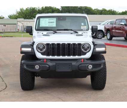 2024 Jeep Wrangler Rubicon is a White 2024 Jeep Wrangler Rubicon SUV in Bay City TX