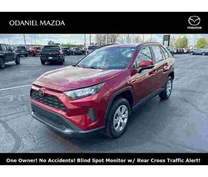 2021 Toyota RAV4 LE is a Red 2021 Toyota RAV4 LE SUV in Fort Wayne IN