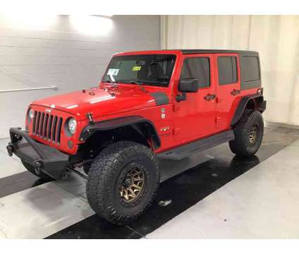 2018 Jeep Wrangler JK Unlimited Sahara is a Red 2018 Jeep Wrangler Unlimited Sahara SUV in Clinton IN