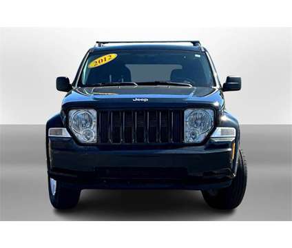 2012 Jeep Liberty Sport is a Black, Green 2012 Jeep Liberty Sport Car for Sale in Durand MI