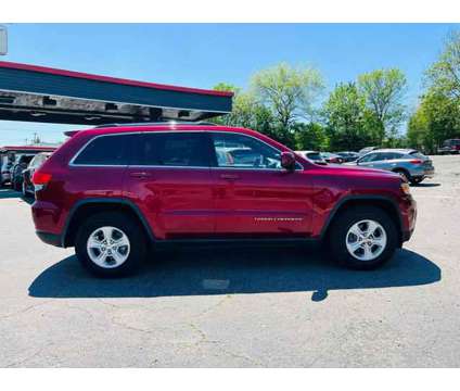 2014 Jeep Grand Cherokee for sale is a Red 2014 Jeep grand cherokee Car for Sale in Charlotte NC