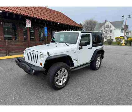 2013 Jeep Wrangler for sale is a White 2013 Jeep Wrangler Car for Sale in Bridgeport CT