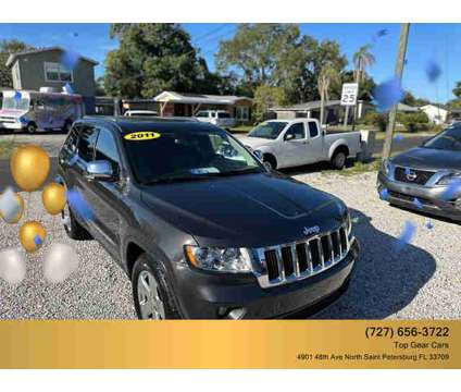 2011 Jeep Grand Cherokee for sale is a Grey 2011 Jeep grand cherokee Car for Sale in Saint Petersburg FL