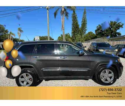 2011 Jeep Grand Cherokee for sale is a Grey 2011 Jeep grand cherokee Car for Sale in Saint Petersburg FL