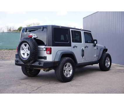2012 Jeep Wrangler for sale is a Silver 2012 Jeep Wrangler Car for Sale in Greeley CO