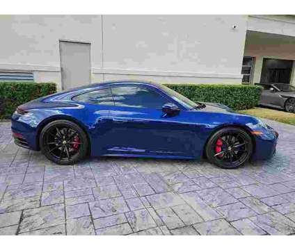 2021UsedPorscheUsed911UsedCoupe is a Blue 2021 Porsche 911 Model Car for Sale in Orlando FL