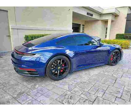 2021UsedPorscheUsed911UsedCoupe is a Blue 2021 Porsche 911 Model Car for Sale in Orlando FL
