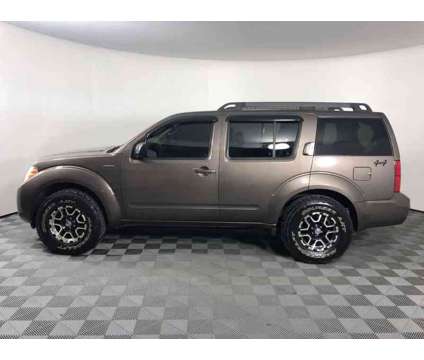 2008UsedNissanUsedPathfinderUsed4WD 4dr V6 is a Brown 2008 Nissan Pathfinder Car for Sale in Shelbyville IN