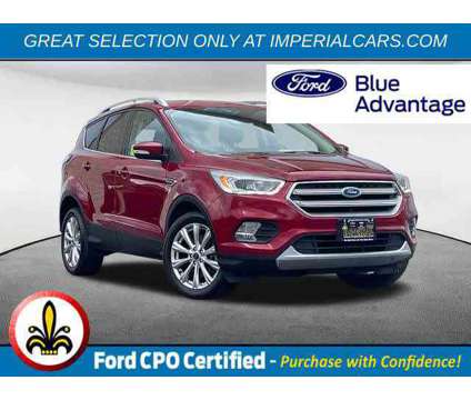 2017UsedFordUsedEscapeUsed4WD is a Red 2017 Ford Escape Titanium SUV in Mendon MA