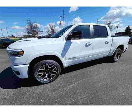 2025NewRamNew1500New4x4 Crew Cab 5 7 Box is a White 2025 RAM 1500 Model Car for Sale in Waconia MN