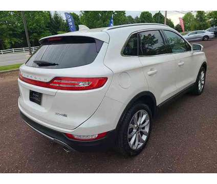 2015 Lincoln MKC LS is a Silver, White 2015 Lincoln MKC Car for Sale in Chester Springs PA