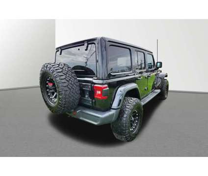 2020 Jeep Wrangler Unlimited Sahara Altitude is a Black 2020 Jeep Wrangler Unlimited Sahara Car for Sale in Harvard IL
