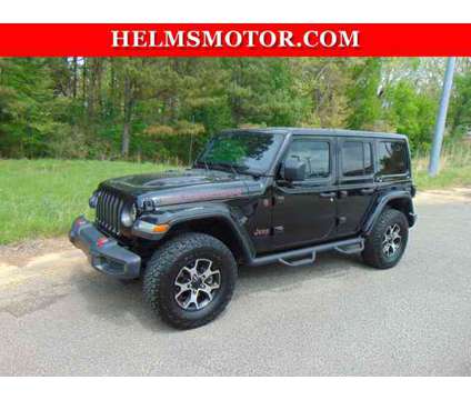 2021 Jeep Wrangler Unlimited Rubicon is a Black 2021 Jeep Wrangler Unlimited Car for Sale in Lexington TN