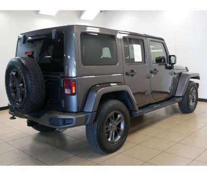 2016 Jeep Wrangler Unlimited 75th Anniversary is a Grey 2016 Jeep Wrangler Unlimited Car for Sale in Saint Louis MO