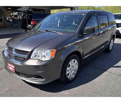 2019 Dodge Grand Caravan SE is a Grey 2019 Dodge grand caravan SE Car for Sale in Hayesville NC