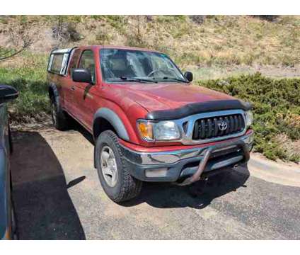2002 Toyota Tacoma is a Red 2002 Toyota Tacoma Car for Sale in Colorado Springs CO