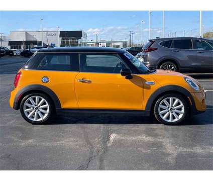 2015 MINI Cooper S Base is a Orange 2015 Mini Cooper S Base Car for Sale in Elgin IL